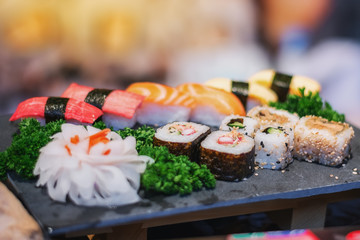 Plate with delicious Sushi dishes on the food festival in Utrecht in Netherlands