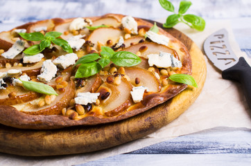 Traditional pizza with pear