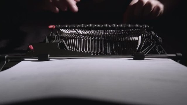 Script writer on a typewriter writes a screenplay for the film