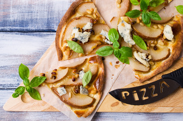 Traditional pizza with pear