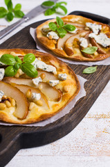 Traditional pizza with pear