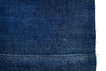 Piece of dark blue jeans fabric