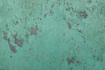 Close up peeling paint on a concrete wall, cracked paint background