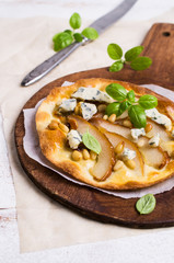 Traditional pizza with pear
