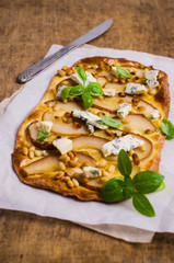 Traditional pizza with pear