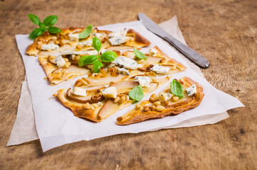 Traditional pizza with pear