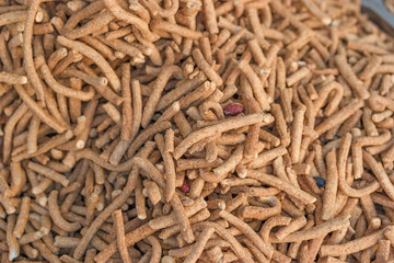 Organic wholemeal bran sticks on a fair stall, selective focus