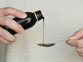 Patient is taking a medicinal syrup