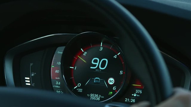 90 km/h driving car in the 90 kph limit zone interior close up shot