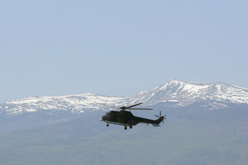 Military helicopter mountain