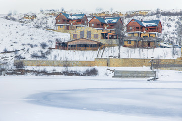 wooden cotedge in winter