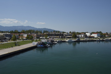 Keramoti village and harbor with with Ipsarion mountain in background