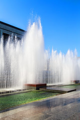 spouting fountains in a beautiful Sunny day in a modern European city