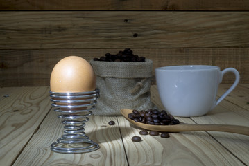 boiled eggs for the breakfast on a wooden table
