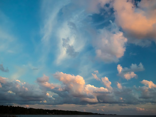 Naklejka na ściany i meble Background: Colorful Clouds in Sunset Sky