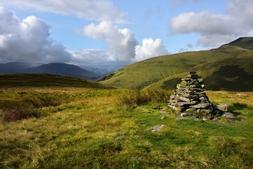 Fototapeta na wymiar Stone cairn on Souther Fell