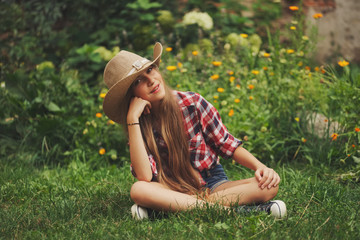 beautiful young cowgirl with long hair