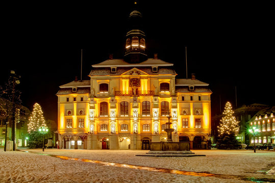 L&uuml;neburg (near Hamburg) Germany: Old famous Townhall with christmas Trees and snow.