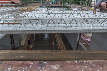Scaffolding and formwork in the installation building on site. Substructure for laying ceiling panels.