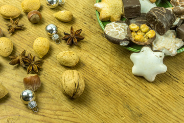 Christmas decoration from different varieties of nuts and biscuits