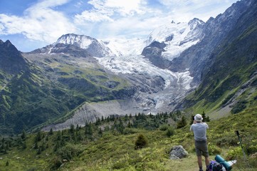 Fototapeta premium Admiring a Glacier on the Tour du Mont Blanc