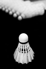 Fototapeta na wymiar White shuttlecock isolated on black background. Shuttlecock is used for badminton games