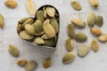 Obraz premium Pepita Seeds in a Heart Shape