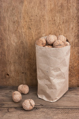 walnuts in a kraft paper bag