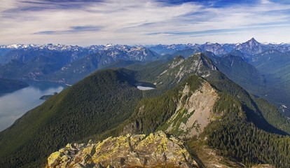 Panoramic Landscape View from Summit of Golden Ears Peak to Distant Snowy Coast Mountains and Lush Rainforest in British Columbia, Canada