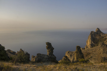 Fototapeta na wymiar landscape of a famous rock formations, bays near the extinct volcano Karadag Mountain in KaraDag reserve in north-east Crimea, Black sea