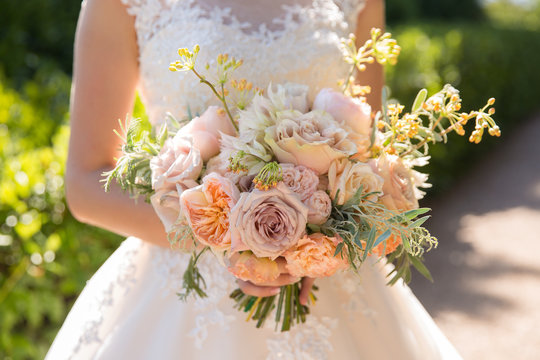 beautiful wedding bouquet in bride's hands.