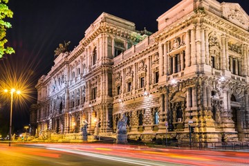 Fototapeta na wymiar Palace of Justice, Rome, Italy at night. Light trails long exposure effect.