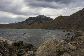 landscape of a famous rock formations, bays near the extinct volcano Karadag Mountain in KaraDag reserve in north-east Crimea, Black sea