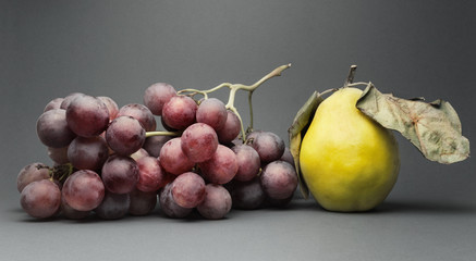 Still life with various ripe fruit, isolated on grey