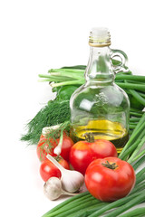 vegetables and a bottle of oil, still life