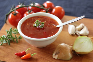 Homemade chilli sauce with tomatoes, garlic, herbs and onion