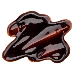 Chocolate syrup drop isolated on white background. Top view. .
