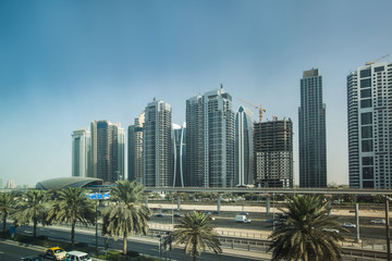 Fototapeta na wymiar Highway and metro station in Dubai, UAE