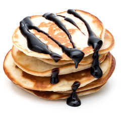 Pancakes  stack with chocolate syrup on white background