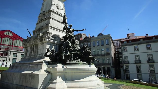 round view in Prince Henry Square and Gardens or Jardim do Infante Dom Henrique and Stock Exchange Palace or Palacio da Bolsa, a national monument and Unesco Heritage of Porto, Portugal.