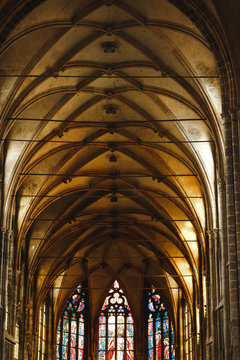 Arch in Saint Vitus Cathedral in Prague. Interior architectural scenery. Vertical orientation. 