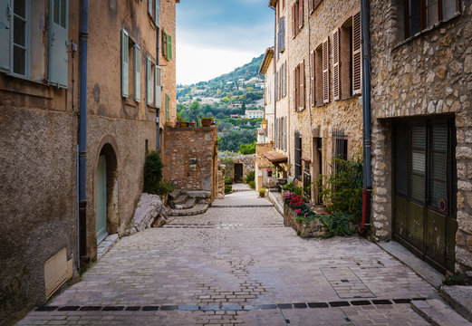 Fototapeta Narrow street in the old town in France.