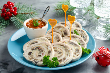 Chicken roll (roulade) with omelet (omelette) and mushrooms