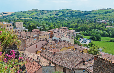 Fototapeta na wymiar landscape with roofs of houses in small tuscan town in province, Italy
