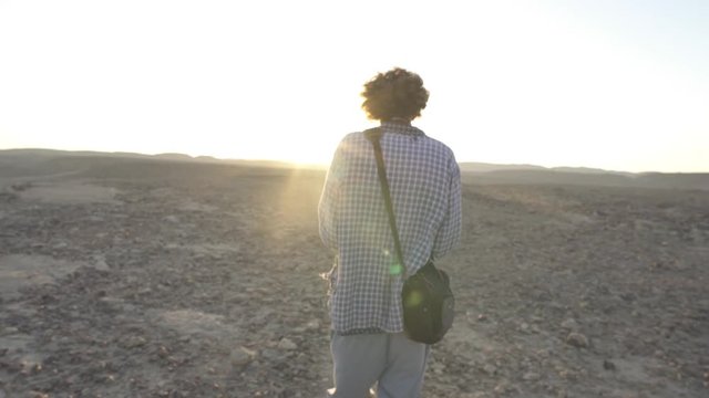 Amateur photographer takes a photo of the desert sun