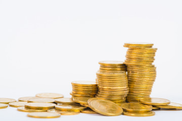 Columns of gold coins, piles of coins on white background