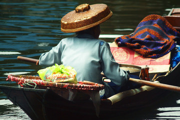 Seller on boat , floating market ,Thailand