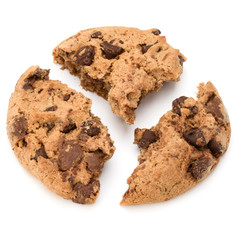 One broken Chocolate chip cookie isolated on white background. Sweet biscuit crumbs. Homemade pastry.
