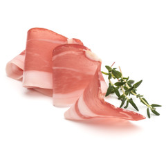 Italian prosciutto crudo or jamon. Raw ham. Isolated on white background