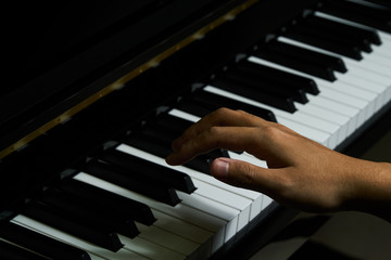 Obraz premium Playing piano in studio with close up shot